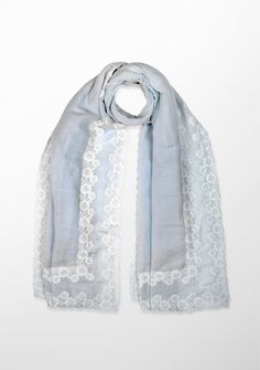 Indulge in the timeless allure of this gracefully hand crafted scarf. Created from a very light and airy linen and modal blend, this light blue scarf is emboldened by a contrasting double white floral lace border. The intricate lacework, reminiscent of blooming petals, adds a touch of romance to the scarf's design, creating a captivating visual interplay. This versatile accessory effortlessly transitions from casual to formal, providing a graceful complement to any ensemble. Elegant Blue Dupatta For Spring, Elegant Blue Shawl For Spring, Elegant White Shawl For Spring, Light Blue Scarf, Gifted Hands, Blue Scarf, Lace Border, Scarf Design, Ivory Lace