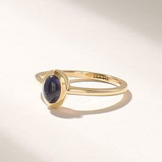 Introducing the exquisite Solid Gold Blue Iolite Solitaire Ring, a true masterpiece in the realm of fine jewelry. Handcrafted with utmost precision and attention to detail, this ring combines the timeless elegance of solid gold with the radiant allure of a bezel-set solitaire gemstone. Features * Gold KT: 10K, 14K, 18K * Custom Gold Color: Rose Gold, Yellow Gold, White Gold * Top of Band: 8.00x6.60MM * Width of Band: 1.50MM * Thickness of Band: 1.30MM * Main Gemstone: Natural Iolite * Total Ctw: 0.50 Ctw * Ready to Ship in 5-7 Business Days ✓ We care about the environment,the jewelry we cast is made with recycled gold. We source exclusively post-consumer material that is refined back to their pure elements to ensure that the gold is in the same quality. Our designs are made from 14k/18k/10 Pinky Promise Ring, Blue Gemstone Rings, September Birthstone Jewelry, Gold Top, September Birthstone, Recycled Gold, Blue Gemstones, Polish Jewelry, Solitaire Ring