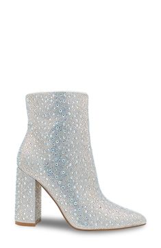 Sparkling crystals add undeniable glamour to a pointy-toe bootie lifted by a bold block heel. 3 1/4" heel 6" shaft Side zip closure Cushioned footbed Synthetic upper, lining and sole Imported Glamorous Ankle Boot Heels With Reinforced Heel, Glamorous Ankle Boots With Reinforced Heel, Glamorous Ankle Heeled Boots With Reinforced Heel, Glamorous Evening Heeled Boots With Block Heel, Glamorous Silver Boots With Reinforced Heel, Glamorous Sparkling Ankle Boots, Elegant Rhinestone Boots With Block Heel, Glamorous Block Heel Boots For Night Out, Glamorous Evening Boots With 4-inch Heel