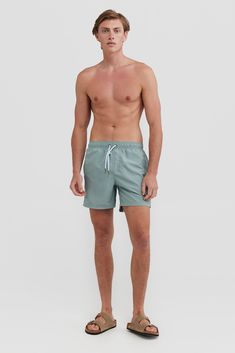 The Hyams Sage Swim Shorts are the perfect addition to your summer wardrobe. Made from 100% Recycled Polyester, these mid-length shorts are quick-drying and lightweight. The elastic waistband with drawstring provides an adjustable fit, while internal fine mesh briefs provide extra comfort. Pair with one of our Box Logo T Shirts for the perfect summer look. Quick drying, mid-length swim shorts Pale blue with white floral print 100% Recycled Polyester Internal fine mesh briefs Elastic waistband wi Pink Swim, Logo T Shirts, Mid Length Shorts, Fine Mesh, Logo T, Box Logo, Summer Look, Mens Bottom, Pale Blue