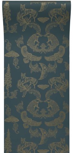 a blue and gold wallpaper with dragon designs on it