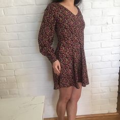 This Is A Darling Floral Dress With A Full Bodied Skirt And A Scoop Neckline. The Silhouette Is 60s-Seque And A Great Way To Add Curves To Your Figure In The Right Places. The Back Neckline Also Is Open And Flattering. Sample Dress From Audrey 3+1one Of A Kind. Casual Mini Hem Lined Dress, V-neck Dresses With Fitted Waist And Lining, Fitted Ditsy Floral Print Dress For Casual Wear, Fitted Floral Dress With Ditsy Print For Casual Occasions, Fitted Ditsy Floral Print Casual Dress, Fitted Dress With Ditsy Floral Print For Casual Wear, Flowy Long Sleeve Dress With Ditsy Floral Print, Vintage V-neck Dress For Brunch, Retro Spring Dresses For Date Night