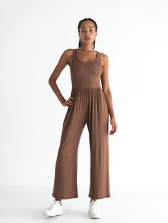 The Hana Jumpsuit is the ultimate done-in-one outfit. With its compressive bodice, high wasted culotte pant, and deep side seam pockets, it’s designed to be effortlessly elegant while simultaneously maximizing your comfort level. Wear it as is to a dance class, or to walk to the park. Or layer it with your favorite lit Elegant Bodysuit, Comfy Heels, Fitted Jumper, Culotte Pants, Dance Class, Active Wear Outfits, How To Do Yoga, Minimalist Outfit, We Wear