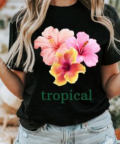 Tropical Unisex Jersey Short Sleeve Tee, Cool Shirts, Vacation, Summer, Flowers, Trendy, Beach, Hibiscus, Aloah, Holiday, Statement This classic unisex jersey short sleeve tee fits like a well-loved favorite. Soft cotton and quality print make users fall in love with it over and over again. These t-shirts have ribbed knit collars to bolster shaping. The shoulders are tapered for a better fit over time. Dual side seams hold the garment's shape for longer. .: Made with 100% Airlume combed and ring Trendy Beach, Mama Shirts, Prism Color, Summer Flowers, Leisure Wear, Jersey Shorts, Hibiscus, Cool Shirts, Short Sleeve Tee