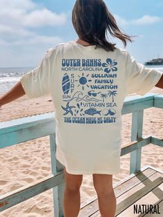 Get ready for your next beach vacation with our matching vacation t-shirts.  Customize your vacation shirts with your family name and location!  We use professional quality DGT printing on all our apparel. Direct-to-garment, or DTG, is a high quality printing method that sprays ink directly onto the garment so there is no peeling or cracking. This fabulous graphic will be printed on a Bella+Canvas Unisex Tee. Order your regular size for a slim fit and size up for an oversized fit. Please refer t Obx Family Vacation Shirts, Beach Shirt Aesthetic, Vacation Group Shirts, Cute Oversized Shirts Summer, White Tropical T-shirt For Beach Season, Custom Print T-shirt For Beach Vacation, White Relaxed Fit Camp Shirt For Vacation, Cotton Camp Shirt For Beach Vacation, Family Vacation Graphic Print T-shirt