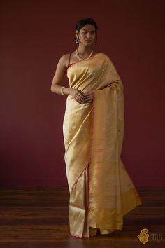 "A\u00a0magnificent Banarasi treasure, this is an extravagant\u00a0saree with an allover\u00a0zari vasket weave in a zig-zag pattern on a body\u00a0of Katan Silk. Rich, unconventional, and utterly fabulous!\n\n\n\nColor\u00a0- A\u00a0beautiful shade of\u00a0Mustard\n\nTechnique\u00a0- Classic handwoven Banarasi Zari Vasket art passed down through generations.\u00a0 Border and pallu in an enduring Kadwa weave. The elaborate and laborious Kadwa (Kadhua) technique involves hand-weaving each motif separately. It takes longer on the handloom, but makes a more robust pattern, which stands out on the fabric.\n\n\nFabric\u00a0-\u00a0Soft as butter, pure Katan Silk\n\nSpeciality\u00a0-\u00a0Stunning zari work\u00a0created using a supplemental zari weft throughout the body of the saree. An unfussy z Luxury Yellow Katan Silk Saree, Katan Silk, Zig Zag Pattern, Handloom Saree, Blouse Piece, Zig Zag, Soft Fabrics, Mustard, Hand Weaving