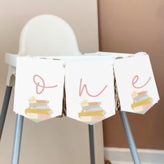 a chair with some cards that say one and two stacked on top of each other