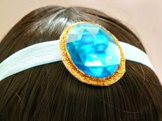 "PRINCESS JASMINE HEADBAND,Aladdin, Halloween Jasmine Costume Cosplay. Big aqua stone attach to blue satin soft headband - very Comfortable:) please choose the size before check out - in order you will choose the right size its best that you will measure your head and then Reduce 1\" from the size of your head - and this is the size that you need:) you can also choose the frame of the stone - Gold Matt Metal Frame or Glitter Frame - please see the last picture:) --------------------------------- Jasmine Headband, Aladdin Halloween, Princess Tiana Costume, Tiana Costume, Princess Jasmine Costume, Girl Group Costumes, Couple Halloween Costumes For Adults, Pirate Halloween Costumes, Greek Goddess Costume