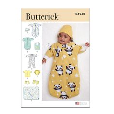 a baby sleeping bag with pandas on it and the words butterick written in white