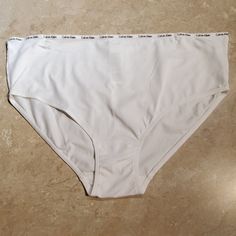 White Cotton Panty By Calvin Klein. Logo Waistband. 95% Cotton/ 5% Elastane Nwot Everyday Cotton Bottoms By Calvin Klein, Calvin Klein Cotton Bottoms With Logo Waistband, Calvin Klein Cotton Bottoms For Everyday, Calvin Klein Casual Bottoms With Logo Waistband, Calvin Klein Wide Leg Cotton Bottoms, Calvin Klein Thong, Calvin Klein Ck One, Calvin Klein White, Calvin Klein Women