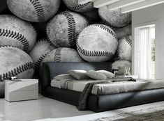 a baseball themed bedroom with black and white wallpaper