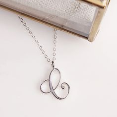 "Letter A Initial Necklace - Cursive \"C\" initial silver pendant - Personalized initial silver pendant for women / Gift for her / for mom Dainty \"C\" initial. Perfect every day necklace. Lovely gift for your self, sister, bridesmaids, new mom. Convo me if you would like to customize the length of the chain. The possibilities are endless. Pendant: Base metal is brass and silver plated. Chain is 18 inches, sterling silver. (if you would like a longer or shorter chain, please contact us to custom Minimalist Silver Initial Necklace For Anniversary, Dainty Silver Necklaces With Initials, Minimalist Silver Monogram Necklace, Sterling Silver Initial Pendant Charm Necklace For Mom, Silver Initials Necklace For Everyday, Silver Monogram Jewelry For Everyday, Silver Minimalist Necklace With Initials, Silver Jewelry With Initials For Everyday, Everyday Silver Necklaces With Initials