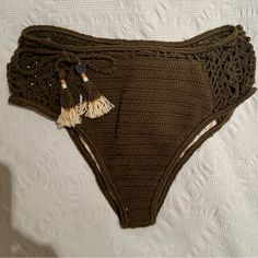 Brand New With Tags, Beautiful Crochet Bikini Bottom In Olive By Australian Brand She Made Me In Size S/M. Purchased Directly From Barneys New York. Summer Crochet Bottoms For Beach, Beachwear Bottoms With Crochet Lace For Vacation, Crochet Lace Beachwear Bottoms For Vacation, Crochet Lace Bottoms For Beachwear Vacation, Crochet Lace Bottoms For Beach Vacation, Green Crochet Swimwear For Vacation, Green Crochet Swimwear For Beach Season, Beachwear Bottoms With Crochet Lace For Beach Season, Casual Crochet Swimwear For Poolside