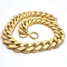 "Nice Hip Hop style Cuban link curb chain with large textured links made of aluminum.  Size: 18\" long and 3/4\" wide. Type: Pre Owned Retro Vintage from the 1980's. Condition: Good vintage condition with good working large spring ring clasp. Materials: Gold plated aluminum. Markings: Unmarked." Luxury 14k Gold Tarnish-resistant Cuban Link Necklace, Gold-plated Cuban Link Jewelry With Solid Construction, Luxury Gold-plated Tarnish-resistant Cuban Link Necklace, Luxury Gold-tone Cuban Link Chain Jewelry, Gold-tone Cuban Link Metal Necklace, Cuban Link Chain Necklaces, Hip Hop Jewelry, Cuban Link, Cuban Link Chain