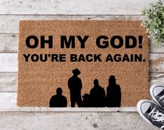 a door mat with the words oh my god you're back again on it