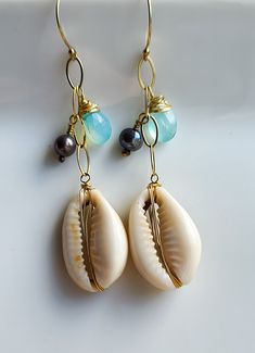 Shell Beachy Jewelry For Summer, Beachy Shell Jewelry For Summer, Summer Shell Jewelry For Vacation, Handmade Coastal Jewelry For Summer, Elegant Dangle Earrings For Vacation, Elegant Shell-shaped Summer Jewelry, Summer Beachy Shell Jewelry, Elegant Summer Shell-shaped Jewelry, Elegant Earrings With Ear Wire For Vacation