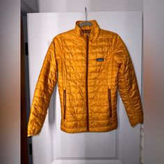 Nwt Patagonia Nano Puff Jacket In Cloudberry Orange, Size Xs Beautiful Mango Color (Uploaded Pics With And Without Flash As Well As Night And Day) Mint Condition, No Flaws Incredibly Warm, Primaloft Insulation Measurements: 25 Inches Long, 18 Inches Pit To Pit, 24 Inches Length Of Sleeve Questions And Reasonable Offers Always Welcomed! Patagonia Casual Puffer Jacket For Fall, Patagonia Casual Fall Puffer Jacket, Casual Patagonia Puffer Jacket For Fall, Yellow Fall Puffer Jacket For Outdoor, Patagonia Long Sleeve Puffer Jacket For Winter, Casual Long Sleeve Patagonia Puffer Jacket, Patagonia Casual Long Sleeve Puffer Jacket, Casual Patagonia Long Sleeve Puffer Jacket, Casual Yellow Puffer Jacket