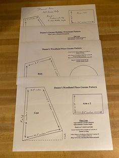 two sheets of paper on top of a wooden table next to each other with measurements