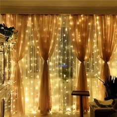 a living room filled with lots of lights and curtains