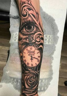 a person with a clock tattoo on their arm