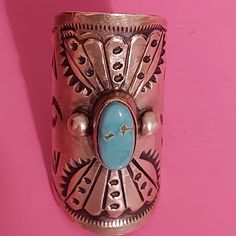 Rare And Beautifully Detailed B Johnson Ring. Turquoise Has Beautiful Visible Veins And High Quality Silver Is Detailed With Artist Engraving Design. The Elongated Design Is A Rare Find In This Band Style. 1.5" L Front Of Ring. Bohemian Turquoise Jewelry With Concho, Bohemian Turquoise Concho Ring, Bohemian Turquoise Concho Jewelry, Bohemian Blue Rings With Concho Detail, Bohemian Blue Rings With Concho, Blue Bohemian Concho Ring, Blue Bohemian Concho Jewelry, Bohemian Blue Concho Rings, Bohemian Silver Turquoise Ring With Patina