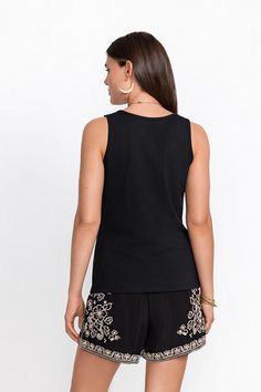 A closet staple, the Organic Cotton Essential Tank is the perfect layering piece to add to your wardrobe. Crafted from pure organic cotton, it is a versatile style for everyday wear. Pair as a stand-alone top with your favorite skirt or as a base layer under a colorful kimono. Johnny Was Women's Organic Cotton Essential Tank Top in Black Beauty, Size XS Spring Organic Cotton Stretch Tops, Spring Organic Cotton Tops, Relaxed Cotton Tank Top For Layering, Cotton Tank Top For Workwear In Spring, Cotton Tank Top For Spring Workwear, Relaxed Fit Cotton Tank Top For Layering, Chic Cotton Crew Neck Tank Top, Chic Crew Neck Cotton Tank Top, Casual Organic Cotton Tank Top For Spring