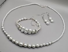 pearl necklace Elegant Pearl Bracelet With Silver Beads For Wedding, Pearl Jewelry With Silver Beads, White Pearl Bracelet With Silver Beads For Weddings, Adjustable White Pearl Bracelet For Mother Of The Bride, White Pearl Jewelry With Silver Beads, White Round Beads Jewelry For Mother Of The Bride, White Pearl Chain Jewelry For Mother Of The Bride, Formal White Jewelry With Silver Beads, Long Bracelet