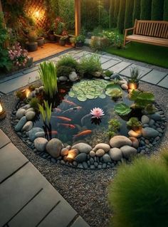 a small pond in the middle of a garden with lit candles and plants around it