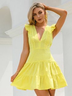 Turn heads in this eye-catching yellow dress, a perfect harmony of style and comfort. The lace detailing along the neckline adds a sophisticated edge to the soft, feminine frills that adorn the sleeves and hem. With a fitted bodice that gracefully transitions into a flared skirt, this dress is a celebration of femininity. Whether you're attending a daytime event or exploring a weekend market, this dress will carry you through with confidence and ease, making it a versatile staple for any fashion Yellow V-neck Dress With Ruffle Hem, Yellow Dress With Ruffle Hem, Sleeveless Lace Trim Dress, Sleeveless Dresses With Lace Trim, Solid Color Sleeveless Dress With Lace Trim, Solid Sleeveless Dress With Lace Trim, Yellow Tiered Summer Mini Dress, Chic Yellow Tiered Mini Dress, Yellow Ruffle Hem Mini Dress For Summer