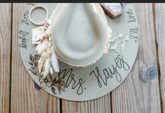 a white hat on top of a wooden table