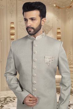 Introducing our latest masterpiece, the Mens Sherwani R14-S65. Made with a delicate pastel color, this sherwani exudes elegance and sophistication. Perfect for special occasions and formal events, this sherwani with unique design make you stand out in the crowd and elevate your style to a whole new level. Elegant Semi-formal Sets For Eid, Designer Formal Traditional Wear In Cream, Designer Cream Traditional Wear For Formal Occasions, Designer Long Sleeve Beige Sherwani, Elegant Beige Nehru Jacket With Intricate Embroidery, Elegant Beige Nehru Jacket With Zari Work, Beige Traditional Drape Sets For Formal Occasions, Elegant Semi-formal Kurta With Dabka Work, Designer Cream Kurta For Formal Occasions