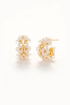 A romantic floral dream for your ears. Spring Chic Jewelry With Flower Decoration, Chic Spring Jewelry With Flower Decoration, Feminine Flower Decorated Jewelry, Spring Feminine 3d Flowers Jewelry, Delicate Flower-shaped Hoop Earrings, Delicate Flower Shaped Hoop Earrings, Spring Hoop Earrings With Flower Charm, Elegant Spring Earrings With 3d Flowers, Spring Small Hoop Earrings