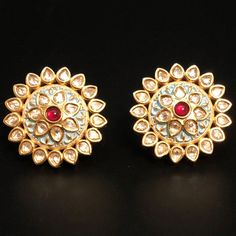 "Kundan Studs,Polki Emerald Studs earrings,Kundan Jhumka,Kundan Earrings,Kundan Jadau Stud Earrings,Kundan Jewelry,Kundan traditional earring These earrings are handcrafted with love and creativity and are perfect for any occasion. These handcrafted beautiful high quality earrings are made in Brass alloy in tribal handcrafted designs with matte gold finish paired with exclusive handwork. Pair them up with Indian traditional outfit such as Anarkalis, Lehengas or Sarees and be the \"Diva\" at your Round Kundan Earrings With Zari Work, Kundan Earrings With Zari Work, Round Meenakari Earrings For Puja, Meenakari Earrings For Puja, Round Shape, Meenakari Round Earrings For Puja, Bollywood Round Earrings For Puja, Temple Jewelry Earrings With Zari Work For Eid, Traditional Kundan Jhumkas With Motifs, Meenakari Earrings For Puja