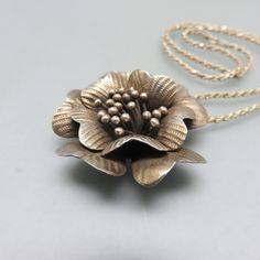 This vintage sterling silver floral pendant and chain are so beautiful. The pendant is so very detailed and lifelike that you can almost smell it. The flower measures 1 3/4 inch high and wide. T The bale is marked 925. The chain is sterling as well and marked 925 . It measures 16 inches long. Both pieces are in excellent condition. The pendant and chain weigh in at 22.20 grams of sterling silver. We will send this to you in a lovely gift box for stellar presentation. If you like vintage silver j Vintage Silver Jewelry, Floral Pendant, Flower Pendant, Rope Chain, Vintage Sterling Silver, Vintage Silver, Lovely Gift, Costume Jewelry, Etsy Vintage