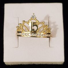 10kt Gold Quinsenera 15 Anios Crown Ring. Weight 2.56gm Width 13.1 Front And 2.7mm Back Size 8 Stones Are Czs Not Diamond 100 % Authentic 10kt Gold Ring Crown Ring, Ring Color, Womens Jewelry Rings, Gold Ring, Gold Rings, Crown, Women Jewelry, Ring, Stone