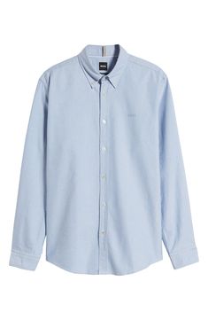 Comfortable and versatile, this solid-color shirt tailored from soft cotton looks great whether you wear it tucked or untucked. 29" length; 40" chest (size Medium) Front button closure Button-down collar Long sleeves with button cuffs 100% cotton Dry clean or machine wash, dry flat Imported Casual Cotton Dress Shirt With Spread Collar, Business Cotton Button-up Shirt, Cotton Business Shirt Button-up, Slim Fit Solid Cotton Shirt, Solid Cotton Slim Fit Shirt, Solid Cotton Shirt With Placket, Slim Fit Cotton Shirt, Collared Cotton Tops For Business, Business Cotton Tops With Placket