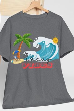 Vacay Vibes T-shirt, Holiday Tee, Vacation Tee shirt, Women's Beach Tee, Gifts for Her, Men's Holiday Tee. Whether you're lounging on a sun-soaked beach, exploring hidden gems in a tropical paradise, or just kicking back with a cool drink in hand - do it all in style in the Vacay vibes T-shirt. .: The classic fit of this shirt ensures a comfy, relaxed wear while the crew neckline adds that neat, timeless look that can blend into any occasion, casual or semi-formal. .: The tear-away label means a Vacay Vibes, Beach Tee, Mens Holiday, Woman Beach, Tropical Paradise, Semi Formal, Tee Shirt, Gender Neutral, Tee Shirts