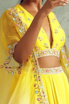 Shop for Priyanka Jain Yellow Organza Cape And Draped Skirt Set for Women Online at Aza Fashions Traditional Summer Choli With Sheer Dupatta, Summer Choli With Sheer Dupatta Traditional Drape, Summer Choli With Sheer Dupatta In Traditional Drape, Floral Embroidered Choli With Cape Sleeves For Parties, Party Choli With Cape Sleeves And Floral Embroidery, Party Choli With Floral Embroidery And Cape Sleeves, Summer Sets With Sheer Dupatta And Cape Sleeves, Embroidered Sets With Cape Sleeves For Summer, Traditional Summer Sets With Cape Sleeves