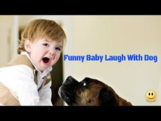 a baby laughing at a dog with the caption'funny baby laugh with dog '