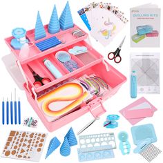 an assortment of crafting supplies in a blue box