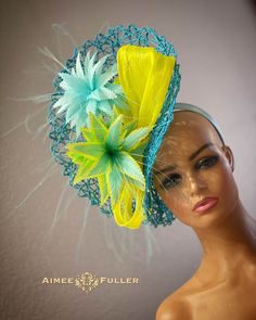 Structured, chic crisscross woven material on this asymmetrical showpiece. Silk ribbon feature and hand-cut fancy feather-bursts. --This style featured on Hatista Dress to Impress (UK)-please see photo gallery-- Easy-to-wear headband fascinator makes a statement, and can be worn to a myriad of events: Easter, Bridal, Derby-Wear, Del Mar Races, Hat Contests, Church, Gala, Kentucky Derby, Melbourne Cup, High Tea, Weddings, Cocktail Parties, Weddings, and More.  Some customization available; please message with your requests to see if we can meet your needs. Other colors available; please inquire before purchase if you need another.  *FREE SHIPPING  For more STATEMENT JEWELRY and HANDMADE HATS go to www.aimeesfuller.com Aimee Fuller has been a trusted online seller since 1999, and is excited Art Hats, Kentucky Derby Outfit, Cup Hat, Oaks Day, Headband Fascinator, Kentucky Derby Fascinator, Blue Fascinator, Royal Ascot Hats, Derby Outfits