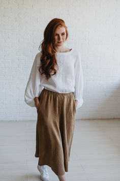 "Camel Linen Skirt, Heavy Weight Linen Skirt, Linen Midi Skirt,  ♠ Effortless long skirt that is made of 100% pure linen. Featuring an elastic waist and side pockets, this rich maxi skirt looks feminine while being super comfy and breezy. Made from natural washed and soft heavyweight linen that has a thick texture and is perfect for the chilly weather.  ♠ Sizes The model on the picture is 165 cm/5'5\" tall and is wearing size S. Have a look at my Size Chart below to make sure your piece will fit you best. ** Custom Orders For any changes or adjustments you may need, please contact us before making a purchase. The amount of the additional payment depends on the type of customization requested. Please allow additional time for custom sized orders. Please note that we cannot accept returns or Elegant Long Skirt With Relaxed Fit, Relaxed Fit Pleated Skirt, Casual Long Skirt With Loosely Fitted Hips, Relaxed Fit Mini Skirt With Lining, Fall Linen Long Skirt, Beige Relaxed Fit Long Skirt, Beige Linen Skirt, Fall Linen, Linen Midi Skirt