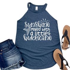 MAIN IMAGE IS A ROCKER TANK TOP! Trendy and Fun Design - The "Sunshine Mixed with a Little Hurricane" design brings a fun, uplifting vibe to your wardrobe, perfect for those with a bold and cheerful personality. Available in Multiple Styles - This design comes in your choice of a comfortable T-shirt, rocker tank top, or cozy sweatshirt, making it versatile for any season. Soft and Breathable Fabric - Crafted with high-quality, soft materials, this top keeps you comfortable whether you're out in the sun or lounging at home. Perfect Gift for Any Occasion - This trendy and stylish graphic top makes an excellent gift for your wife, mother, daughter, sister, co-worker, or friend who loves unique quotes and sayings. Uplifting Statement - Show off your dynamic personality with this unique piece, Funny Summer Tops With Letter Print, Blue Tops With Funny Text For Summer, Blue Summer Top With Funny Text, Funny Slogan Tops For Summer, Funny Letter Print Tops For Summer, Casual Slogan Tank Top For Summer, Funny Screen Print Tops For Summer, Casual Summer Tank Top With Text Print, Funny Cotton Tops For The Beach