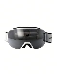 a pair of ski goggles sitting on top of a white surface with black straps