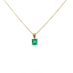 "This solitaire pendant showcases a beautiful square emerald cut Colombian Emerald held by 4 prongs in 18K yellow gold. The pendant length is 13.5mm, and in total the pendant weighs 1.5 grams.  Comes with a 14k gold cable chain of 1mm and 18 inches.  Item Details: - Type: Pendant  - Metal: 18K Yellow Gold  - Weight: 1.5 grams  - Style: Minimalist  - Era: 21st Century  - Setting: Prong  - Size: 13.5mm length  Emerald Details: - Carat: 1.20  - Cut: Emerald  - Color: Green  - Origin: Colombia  - Me Classic Emerald Cut Gemstone Necklace, Formal Emerald Pendant Necklace With Diamond Cut, Luxury Rectangular Emerald Necklace, Luxury Emerald Rectangular Pendant Jewelry, Elegant Rectangular Emerald Necklace, Elegant Rectangular Emerald Necklace For Formal Occasions, Elegant Rectangular Emerald Necklace For Formal Events, Formal Emerald Rectangular Pendant Jewelry, Timeless Rectangular Necklace For Formal Occasions