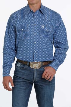 The Cinch Classic Fit features a full body width and extra-long sleeves and tails that provide cowboys with the room and range of motion needed for riding and swinging a rope. Most men can size down from other brands in Cinch Classic shirts. Blue, Black, and White Geometric Long Sleeve Spread Collar Straight Back Yoke 1 Open Pocket Western Button Front 100% Cotton Machine Washable Blue Western Shirt With Button Closure, Blue Western Tops For Rodeo, Blue Button-up Shirt For Ranch, Blue Shirt With Pockets For Rodeo, Blue Tops With Pockets For Ranch, The Cinch, Western Store, Country Men, Cowgirl Western