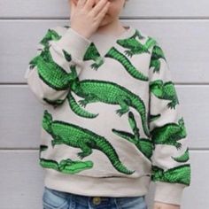 Cool Style For Your Little Ones Even In Spring/Winter. Pattern Loved By Kids. Dinosaur Fans. Wear It Alone, No Jacket Required. Let Them Free! Pair It With Lower And Casual Shoes. Gender Unisex Age 12-24months, 2-4years Pattern Animal Fabric Cotton Blend Season Spring Autumn Casual Cotton Sweatshirt With Dinosaur Print, Casual Green Dinosaur Print Tops, Casual Green Tops With Dinosaur Print, Long Sleeve Cotton Tops With Dinosaur Print, Cotton Long Sleeve Tops With Dinosaur Print, Long Sleeve Cotton Top With Dinosaur Print, Long Sleeve Tops With Dinosaur Print For Playtime, Cotton Cartoon Print Sweatshirt For Playwear, Cotton Top With Dinosaur Print For Fall