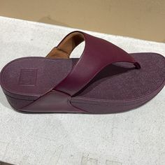 Our Minimalist Lulu Sandals Boast Clean Lines, A Timeless Triangular Vamp, And Softly Padded Leather Uppers. Biomechanically Engineered With Our Triple-Density Microwobbleboard Midsoles, For Pressure Diffusion, Impact Reduction, And Amazing Non-Stop Cushioning And Comfort. Here Crafted In Supple Leather. The Classic Pick That You'll Wear Non-Stop (These Are Perennial Bestsellers For A Reason). Upper Material: Leather Lining Material: Padded Microfibre (Upper) Fastening: Slip-On Outsole: Slip-Res Leather Toe Post Flip Flops With Arch Support, Flat Leather Slippers With Arch Support, Lulu Sandals, Fitflop Shoes, For A Reason, Non Stop, Clean Lines, Women's Shoes Sandals, Density