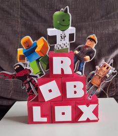 a toy made out of lego blocks with stickers on it that say robbox