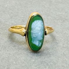 Marked 14K Excellent antique condition, has not been polished 1.8g Victorian Emerald Ring In 14k Yellow Gold, Antique Yellow Gold Emerald Ring, Victorian Emerald Ring In Yellow Gold Stamped 14k, Antique Emerald Ring In Yellow Gold, Antique 14k Stamped Emerald Ring, Antique Emerald Ring In Stamped 14k Yellow Gold, Vintage Gold Emerald Cabochon Ring, Victorian Oval Yellow Gold Emerald Ring, Antique Yellow Gold Cabochon Emerald Ring